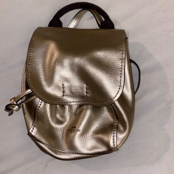 Coach | Bags | Coach Gold Mini Backpack | Poshmark display picture 1